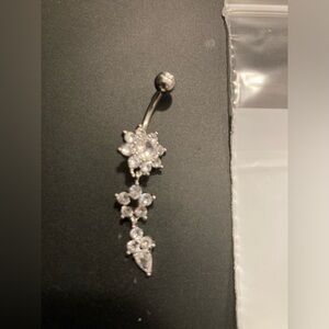 Belly Button ring , dangle style with flowers. New in bag. Super adorable 🥰